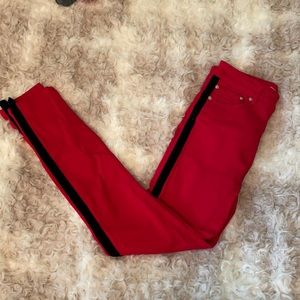 Zara red skinny jeans with black velvet accent